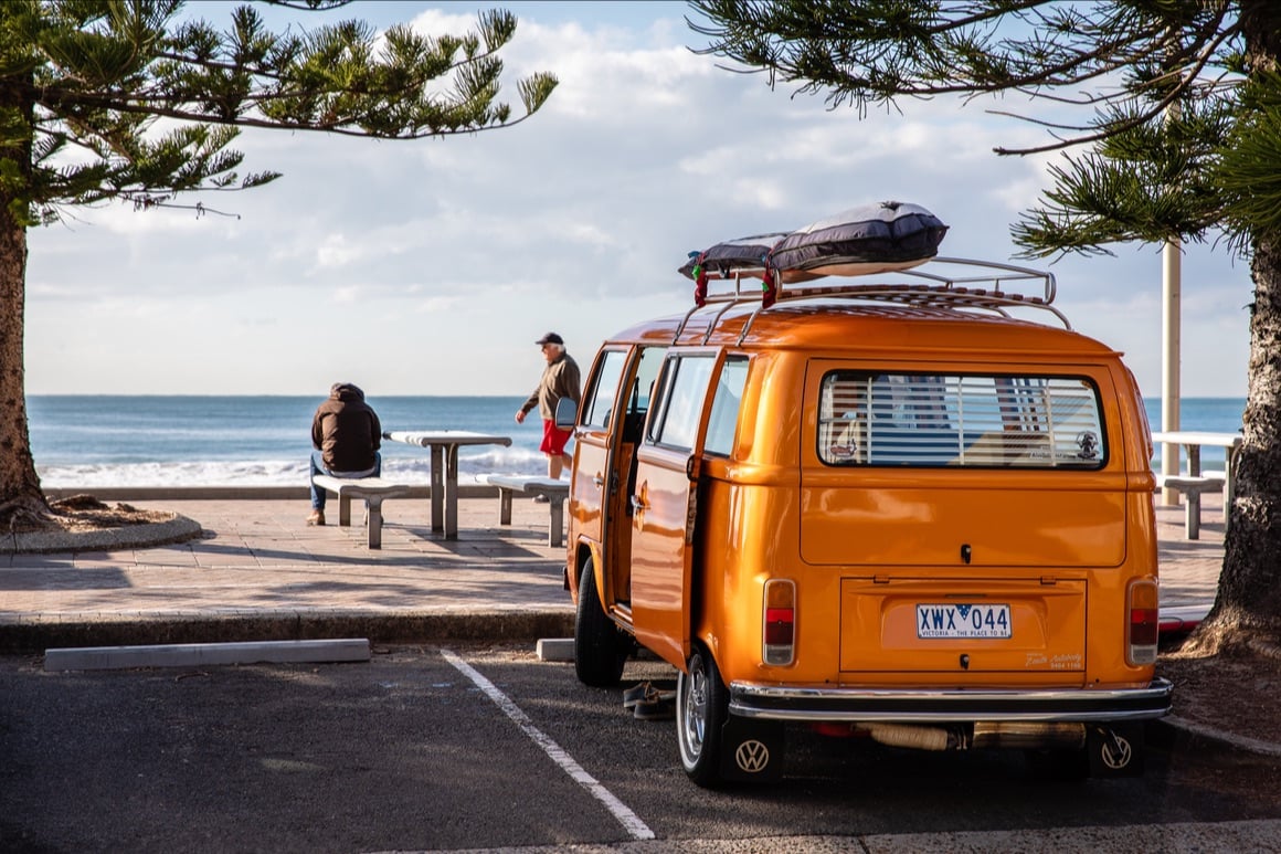 orange camper parked in australia
