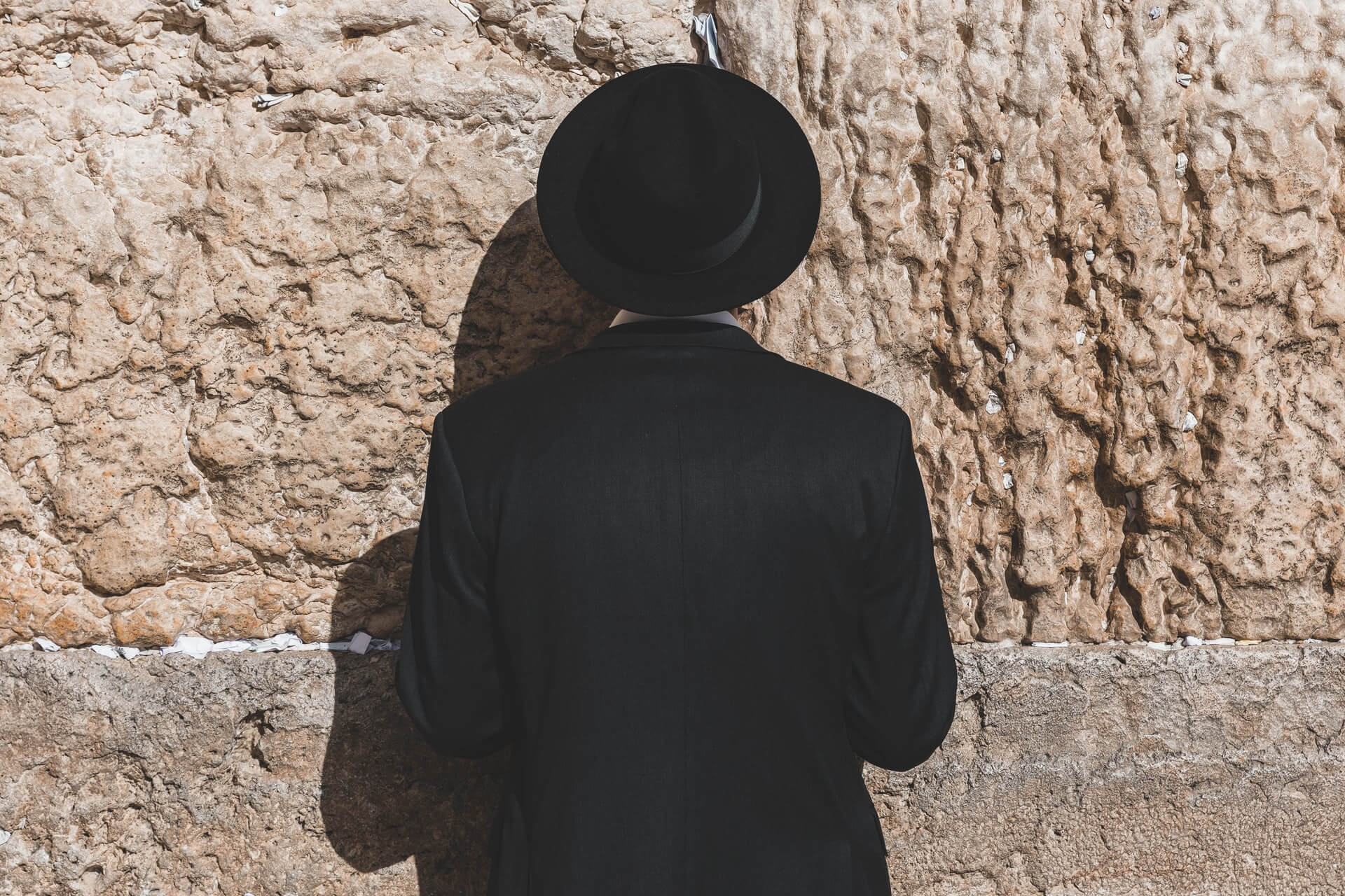 An Ultra-Orthodox Jew praying at the Western 'Wailing' Wall - top historical site in Jerusalem