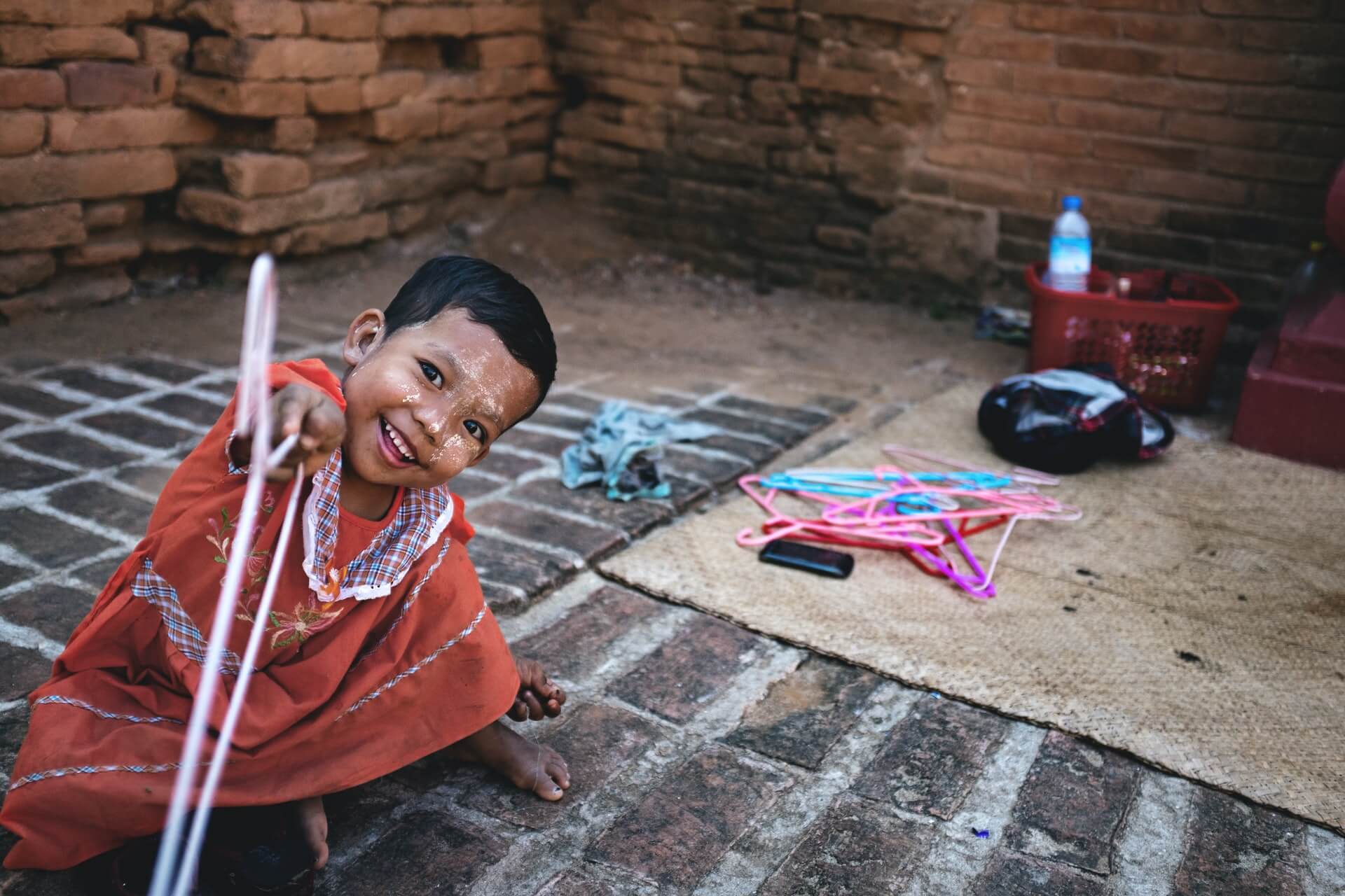 A small Burmese child at a market in Bagan