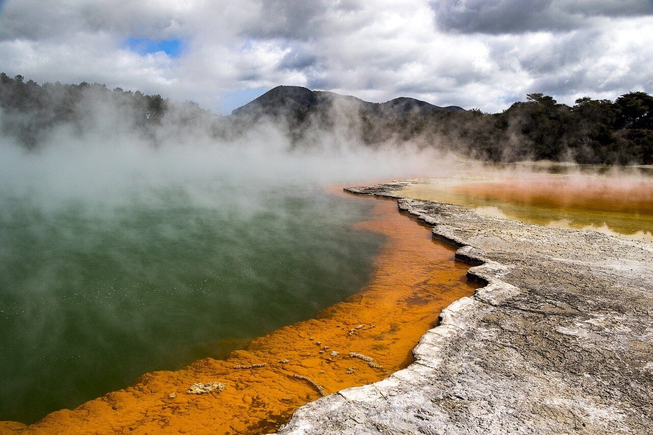 A steaming geothermal pool in Rotorua - popular attraction on North Island