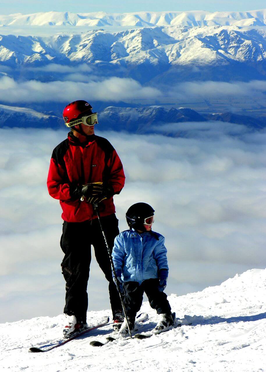A man and his son skiing at Treble Cone near Wanaka and Queenstown