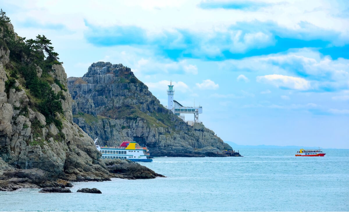 A ferry to Japan from South Korea departs the port in Busan