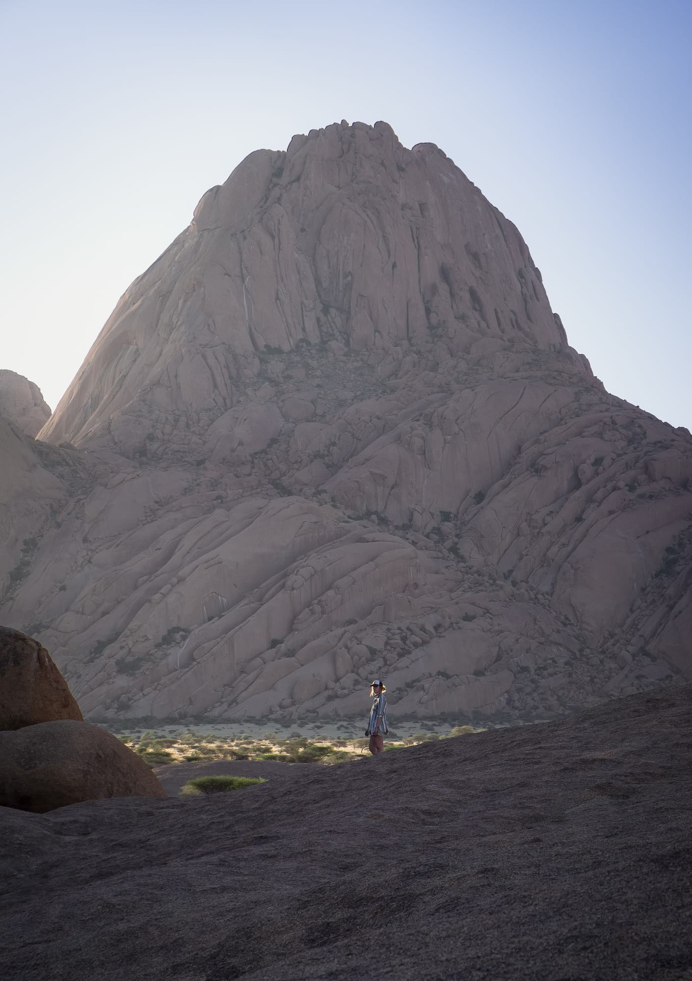 hiker at spitzkoppe namibia