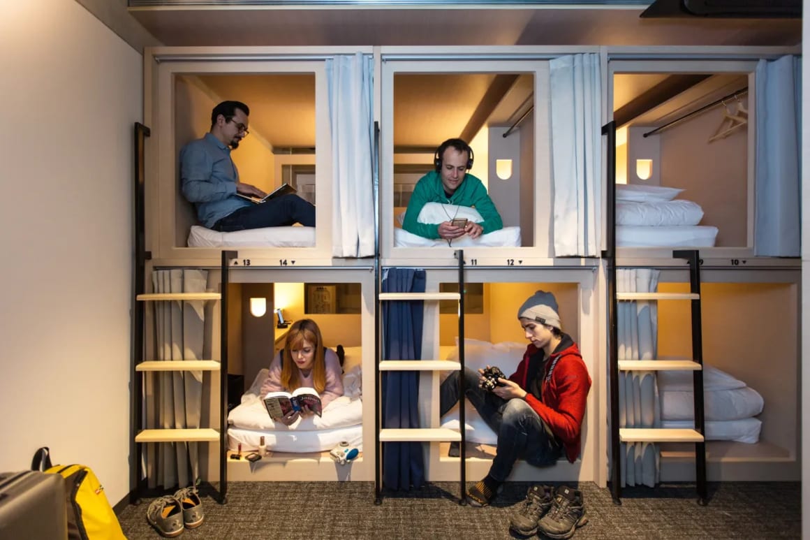 Unplan Shinjuku Tokyo Japan with capsule hostels, people enjoying their own space