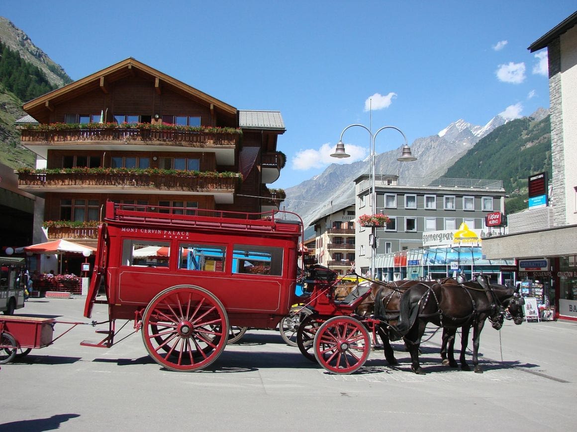 Beautiful red carriage in the middle of Zermatt Town