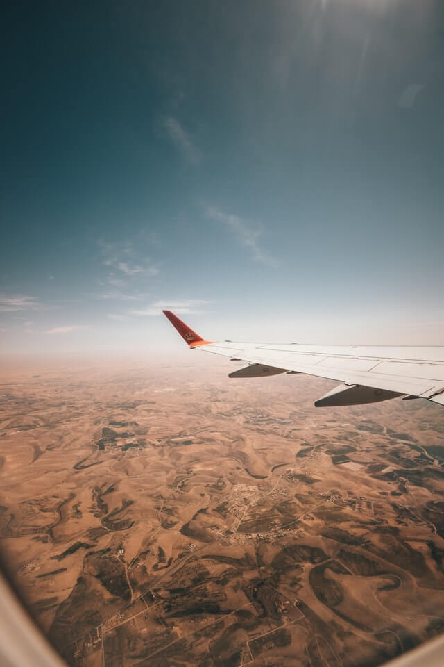 A flight of travellers arriving in Israel flying over the Negev Desert 