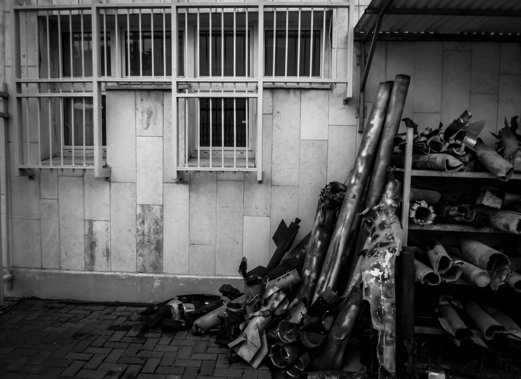 A collection of missile debris from Gaza at a police station in Sderot