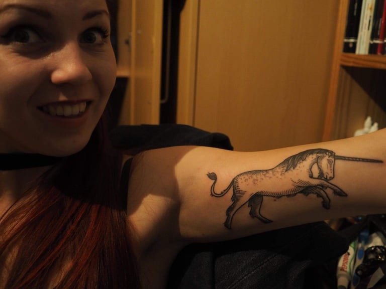 unicorn travel tattoo