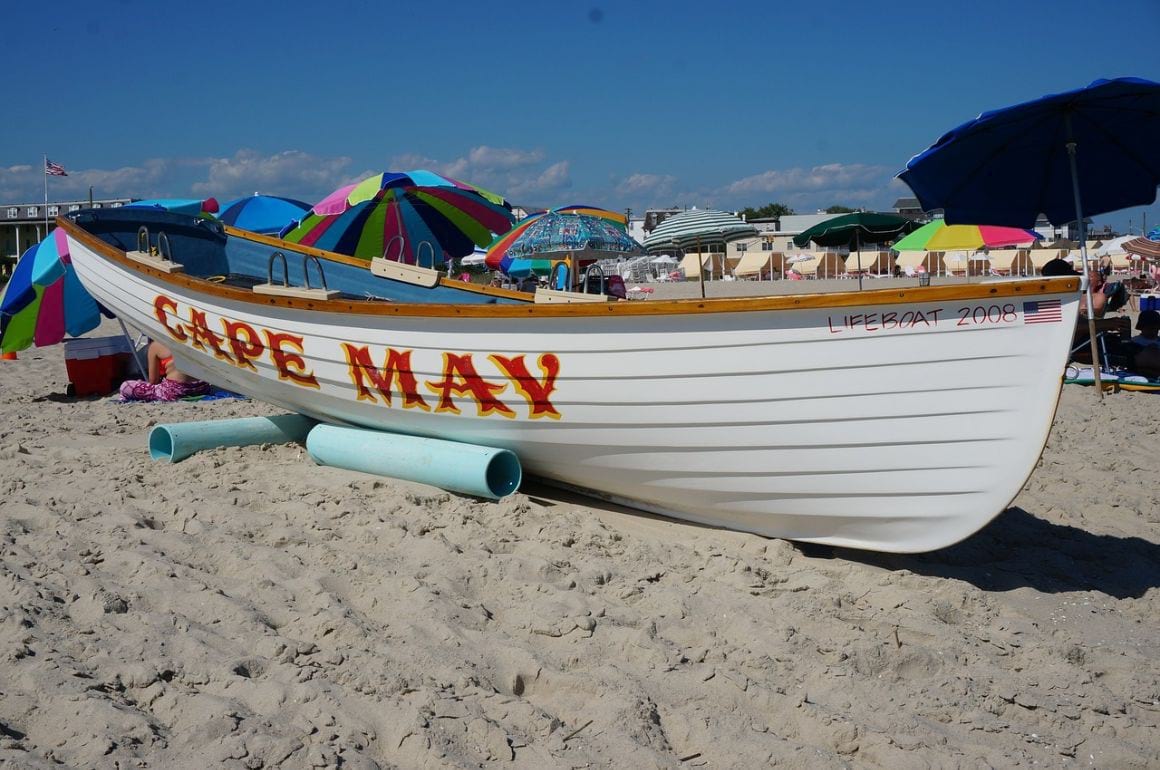 Life boat and brightly colored umbrellas on Cape May Beach