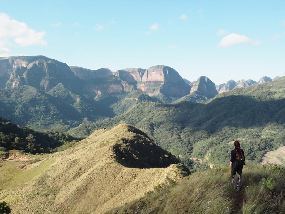 Girl on Bolivian mountains looking into the distance