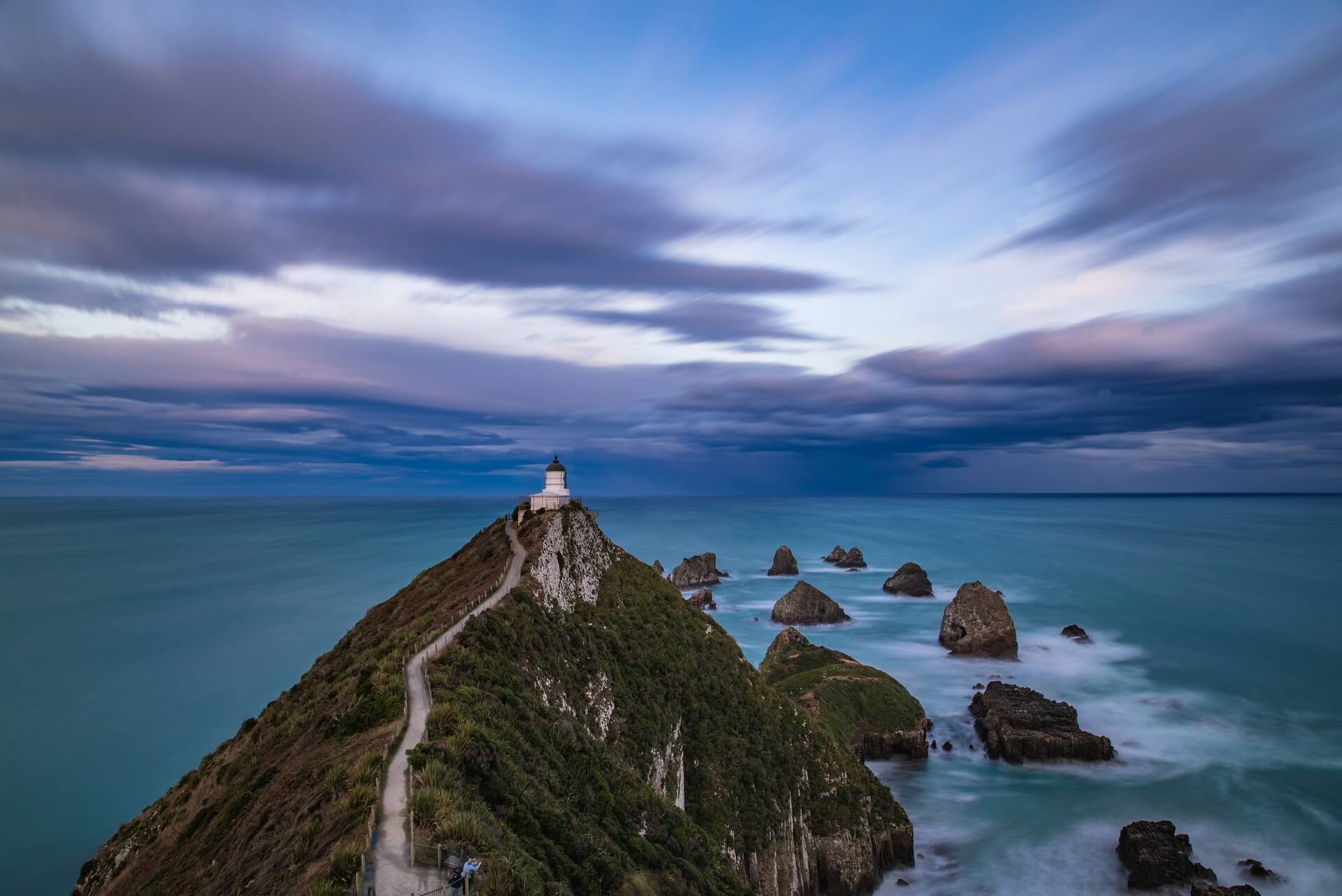 A moody sunrise on the Southern Scenic Route of New Zealand's South Island