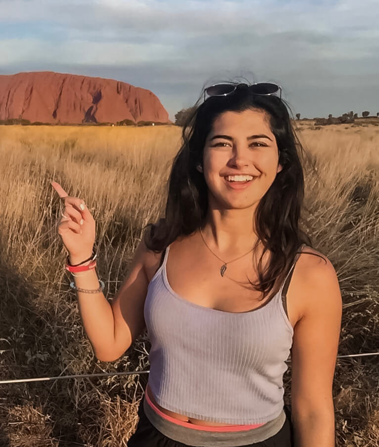 Sophie posing in front of Uluru