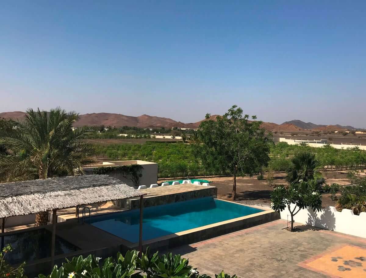 view of one of the best places to stay in oman with a pool in view