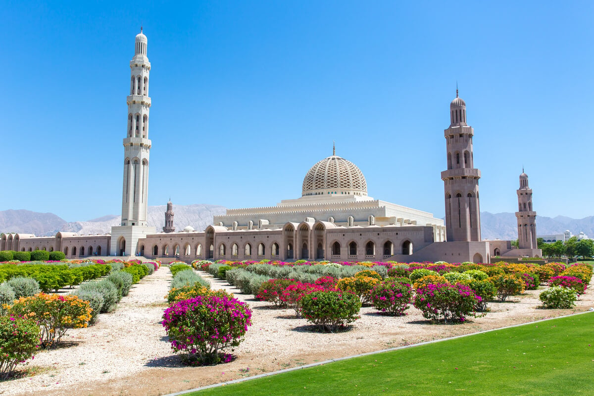 an outside view of the sultan qaboos mosque in muscat