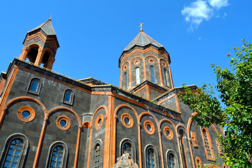 black and orange church in gyumri