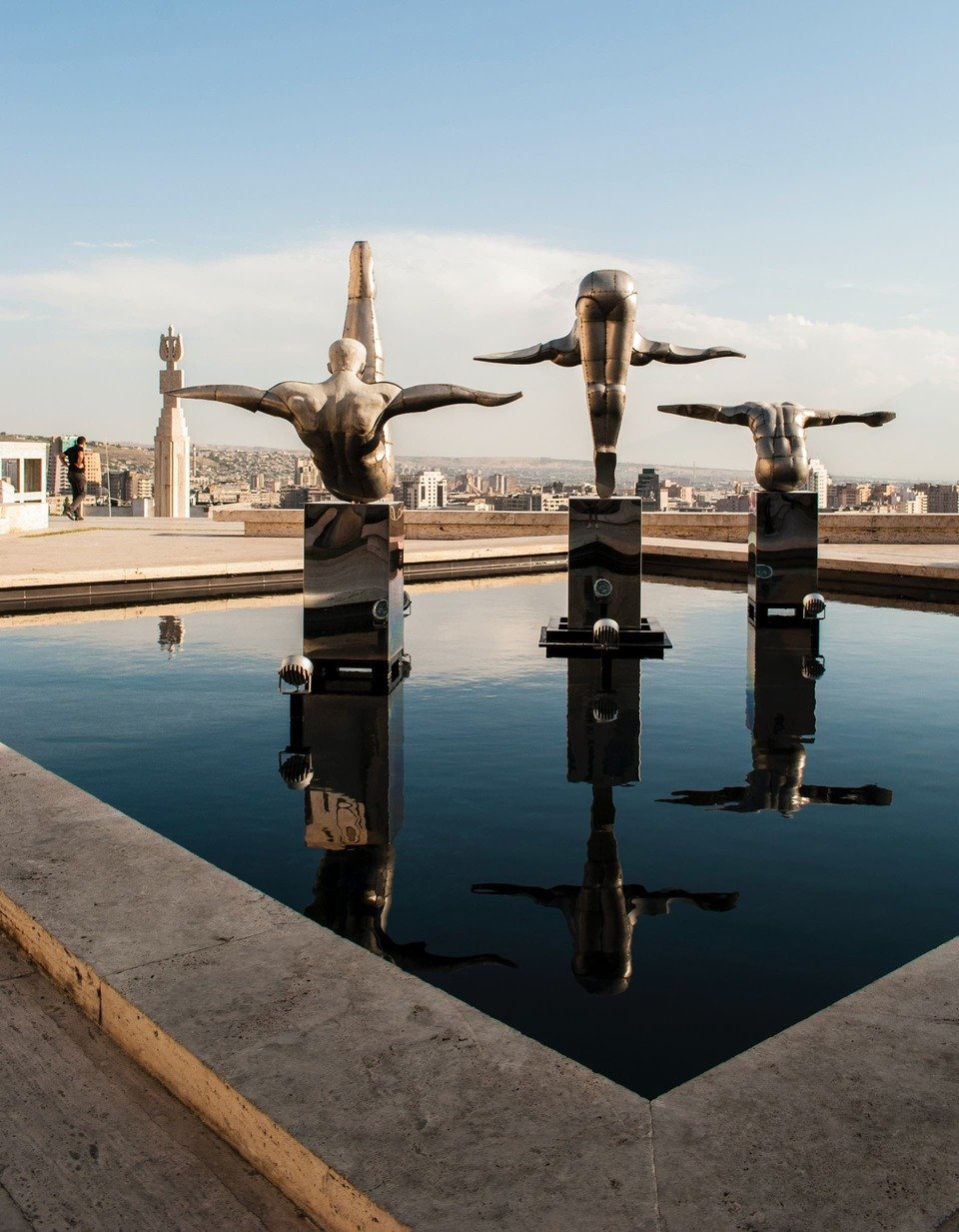 three statues in yerevan