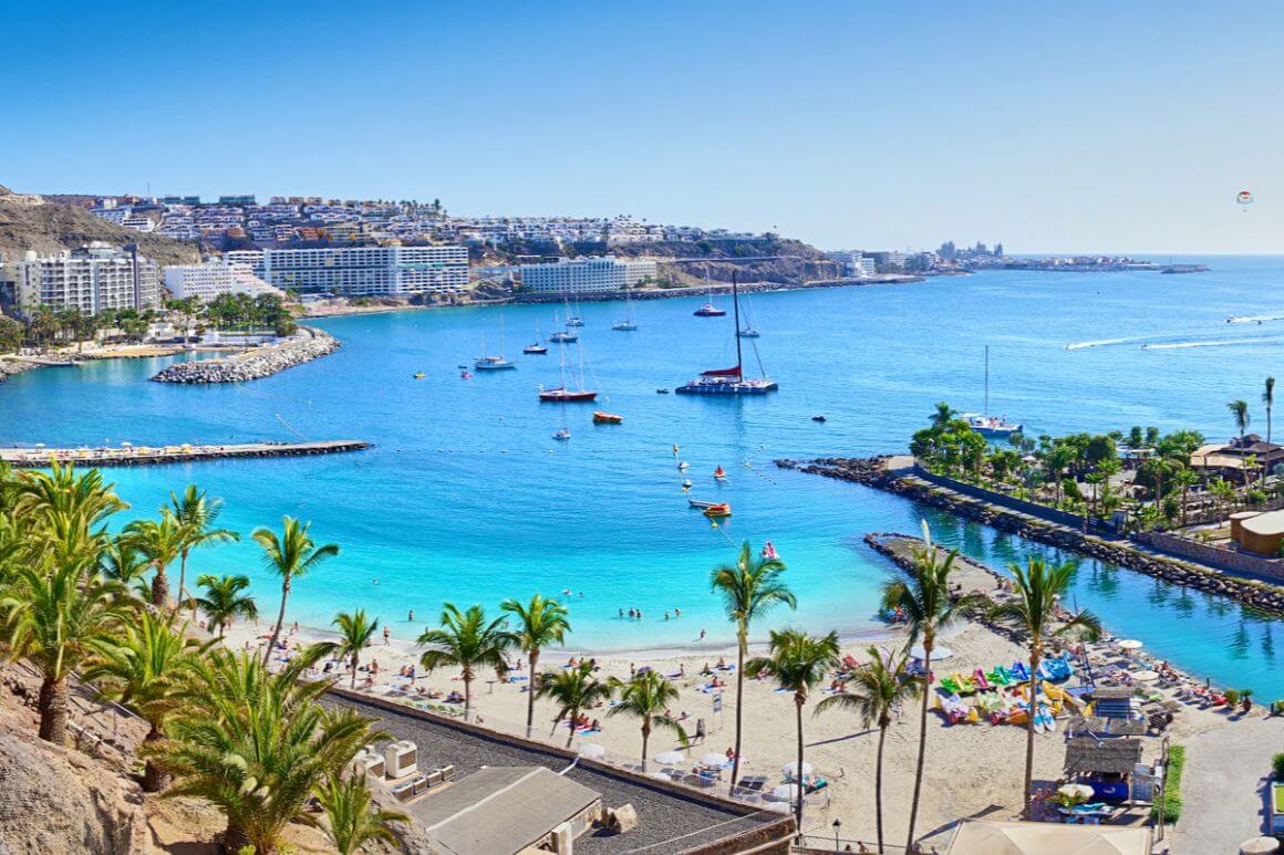 crystal clear blue water in the bay if Playa del Ingles Gran Canaria