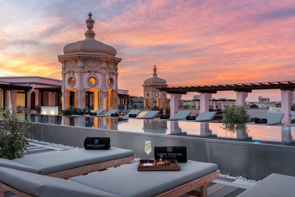 stunning candy sunset skies over the Alis Rooftop Terrace bar at Santa Catalina, a Royal Hideaway Hotel 5 GL Gran Canaria
