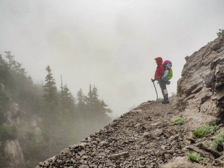 hiker on a misty mountain