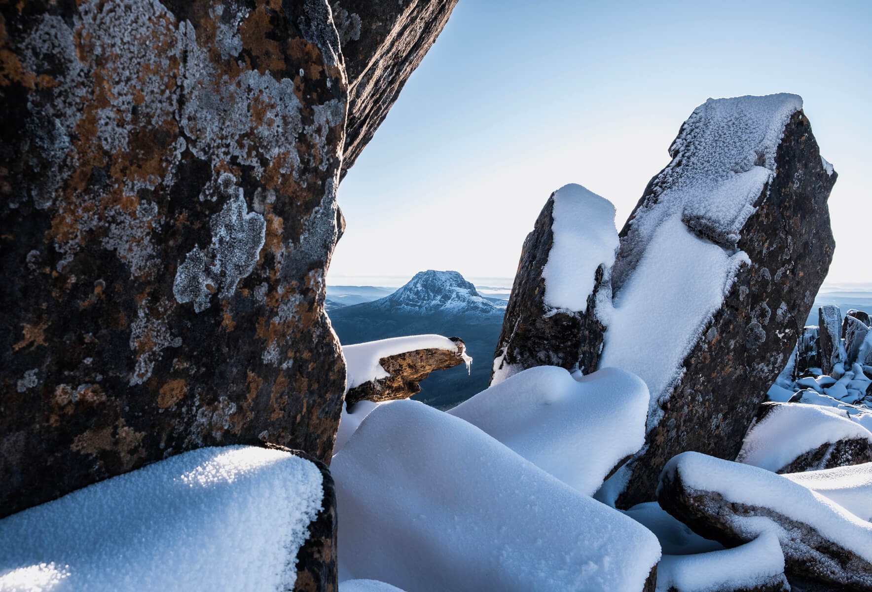 Snow-covered Cradle Mountain photographed from Barns Bluff in Tasmania in winter.