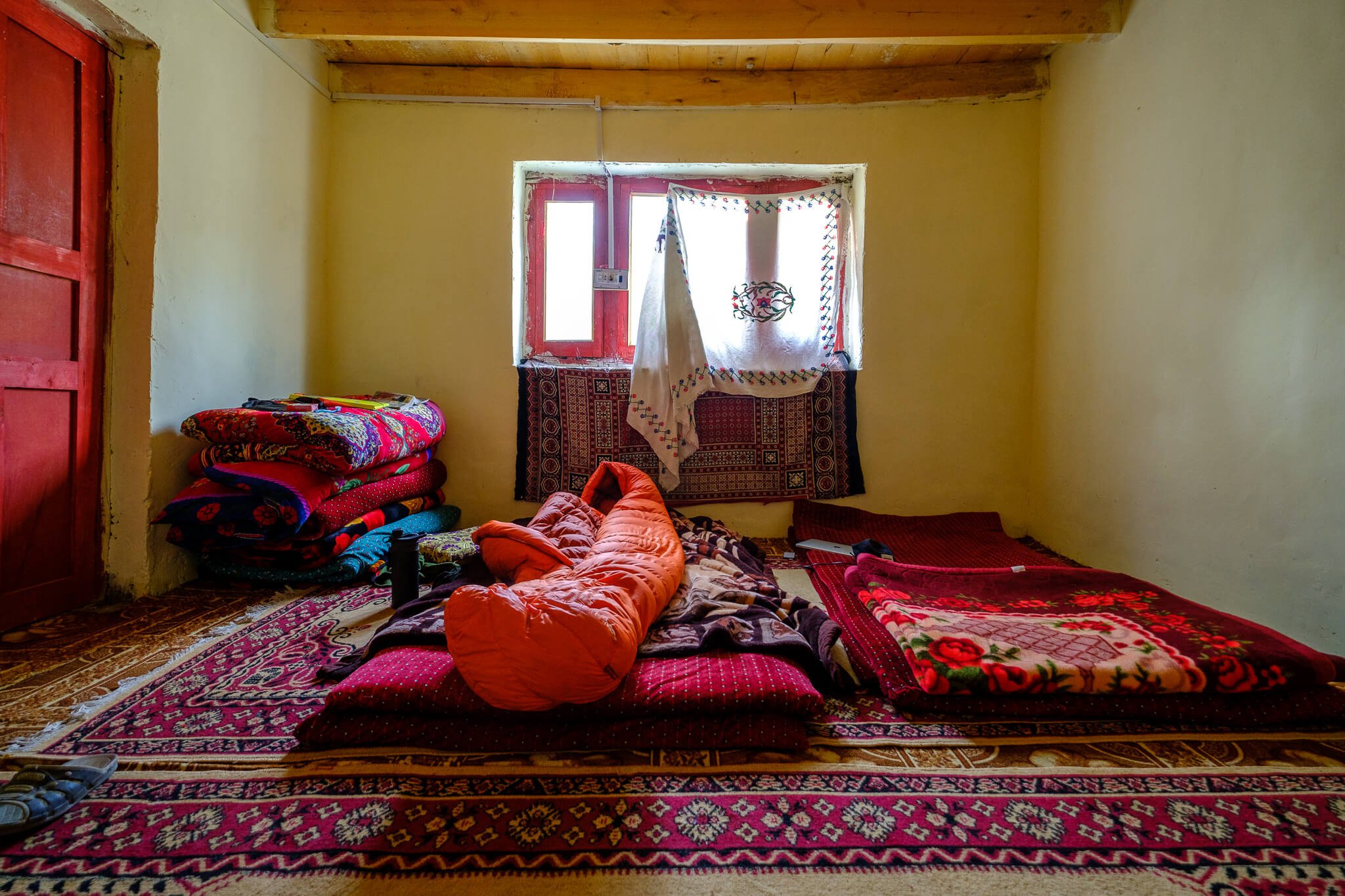 budget travel room in a guesthouse in pakistan