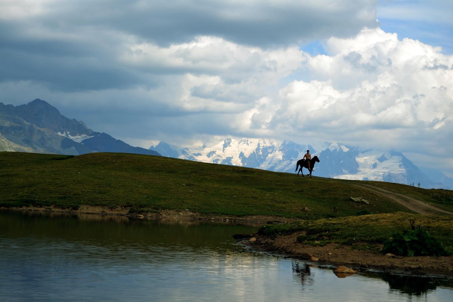 horse rider at korulda lakes, mestia
