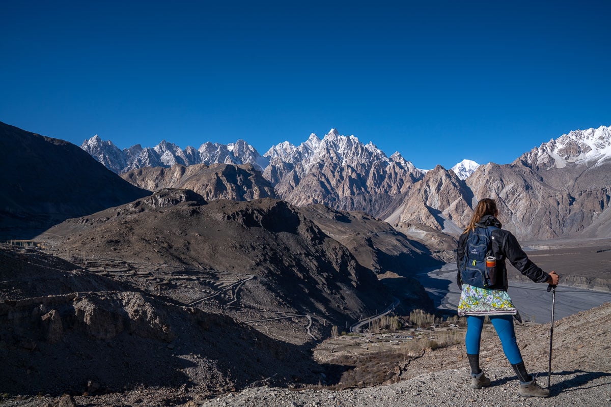 girl staring at passu cones while traveling in pakistan