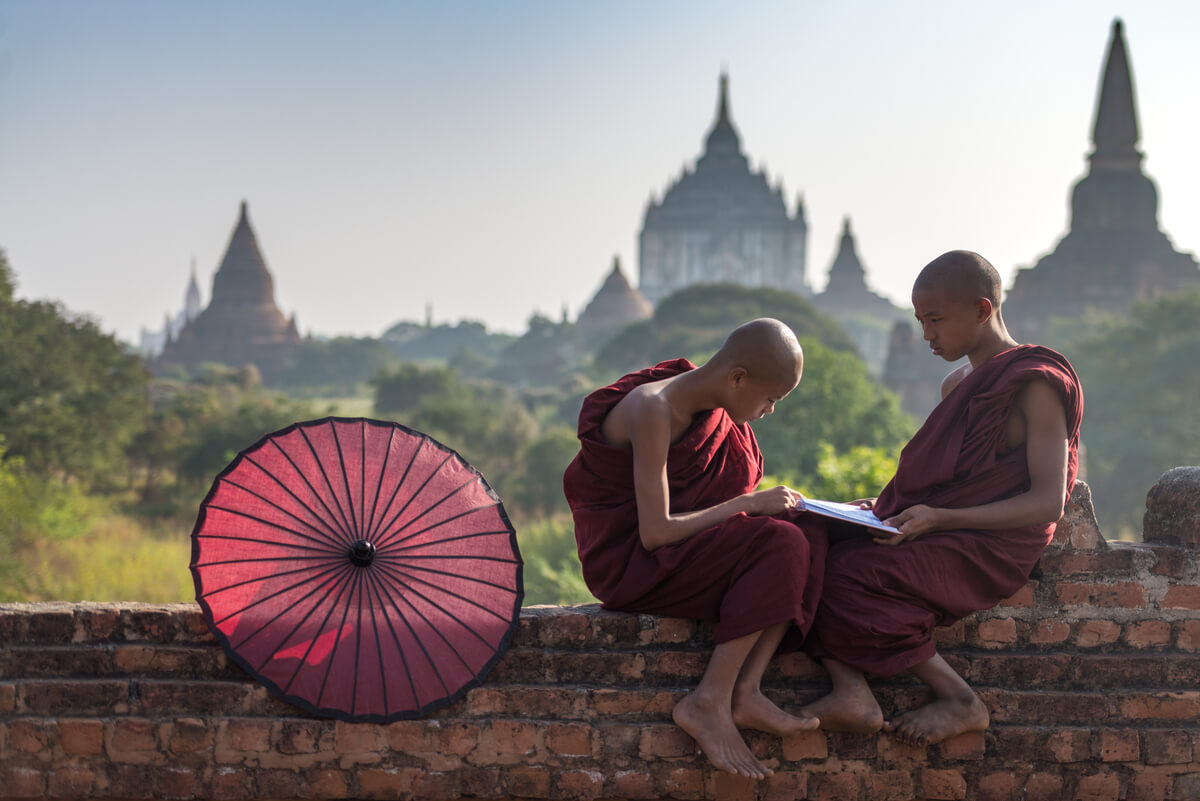 Two monk children in Myanmar learning english without a degree