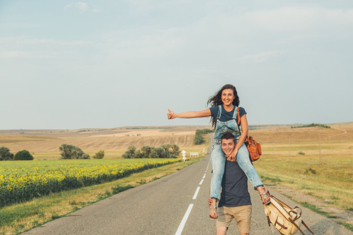 Two young hitchhikers hipster