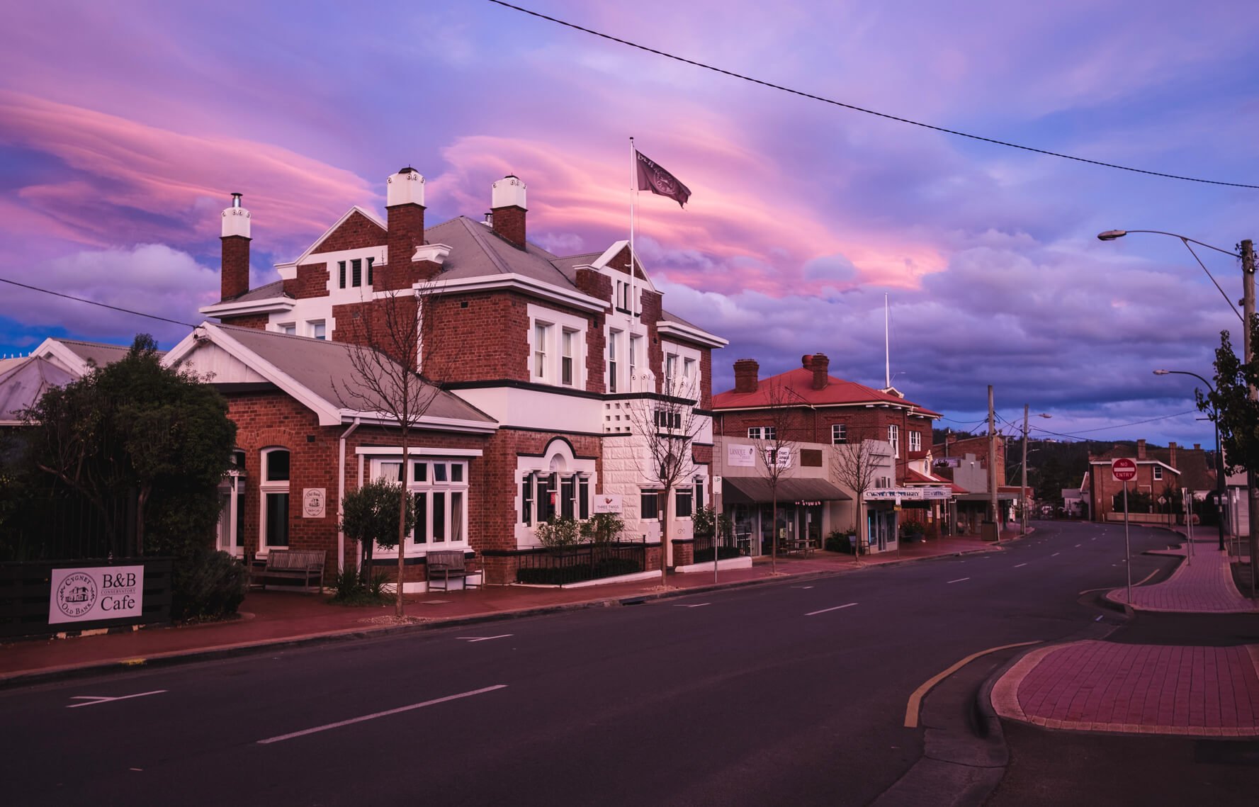 A vibrant sunset in the main street of Cygnet, a town in southern Tasmania