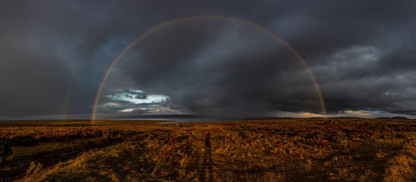 A beautiful rainbow photographed on one of the best multi-day hikes in Tasmania on the Central Plateaus