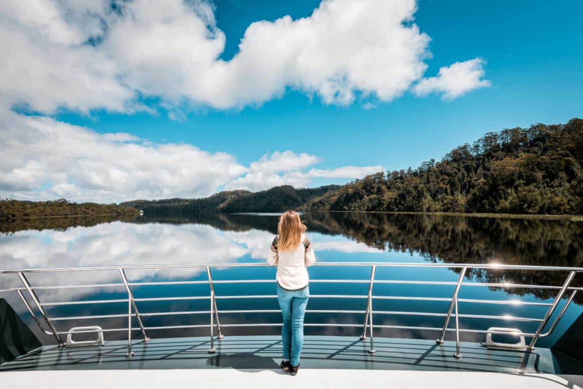A tourist touring Tasmania on the Gordon River cruise
