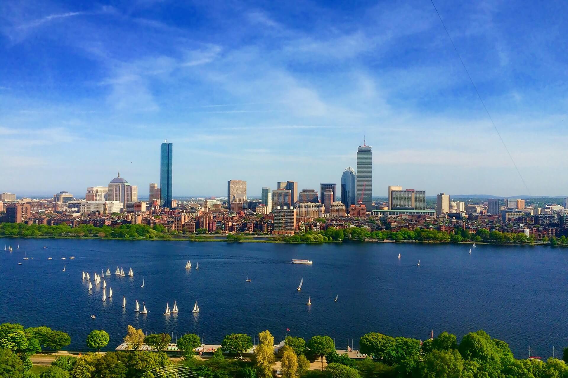 boston river and skyline on a sunny summe day