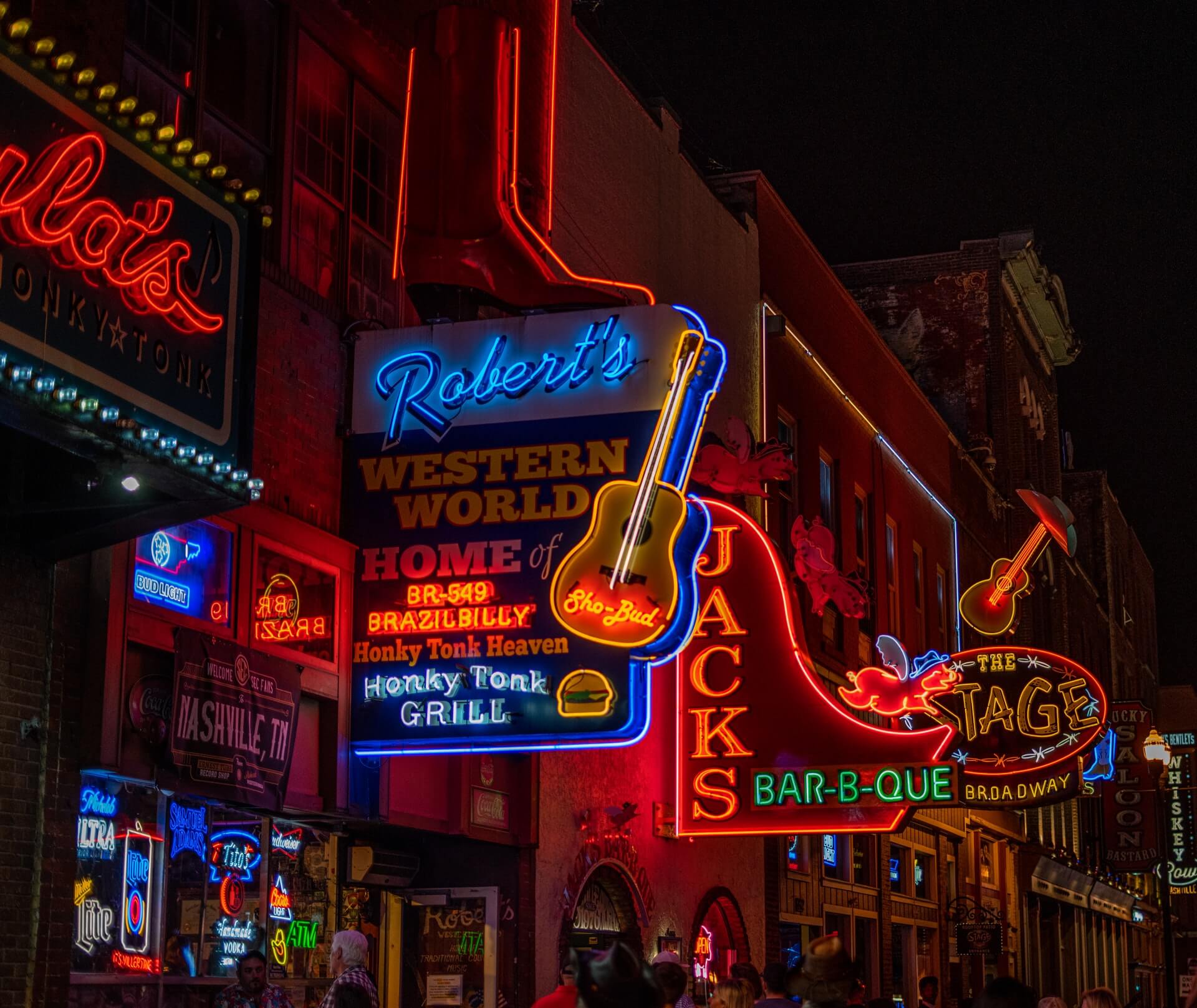 neon lights and colors on honky tonk highway in nashville