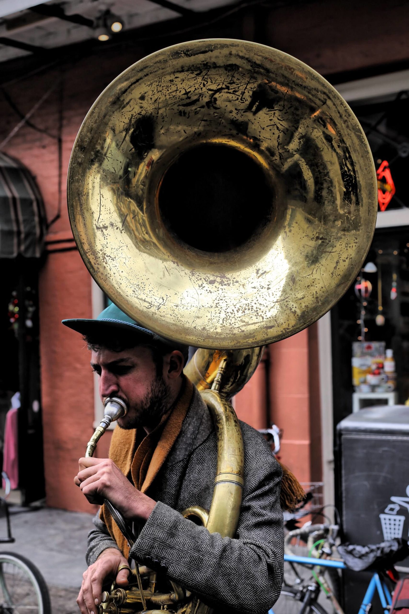 man playing a tuba while traveling in new orleans