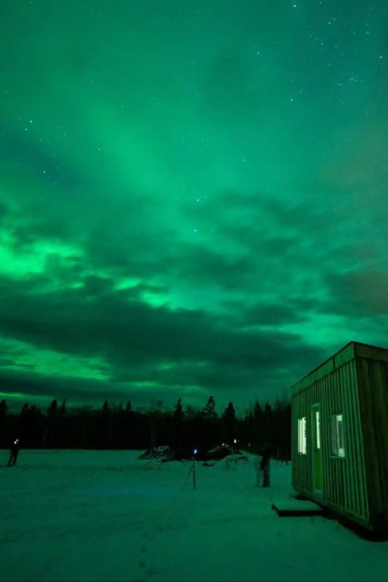 See the Northern lights from a warm cabin, Canada