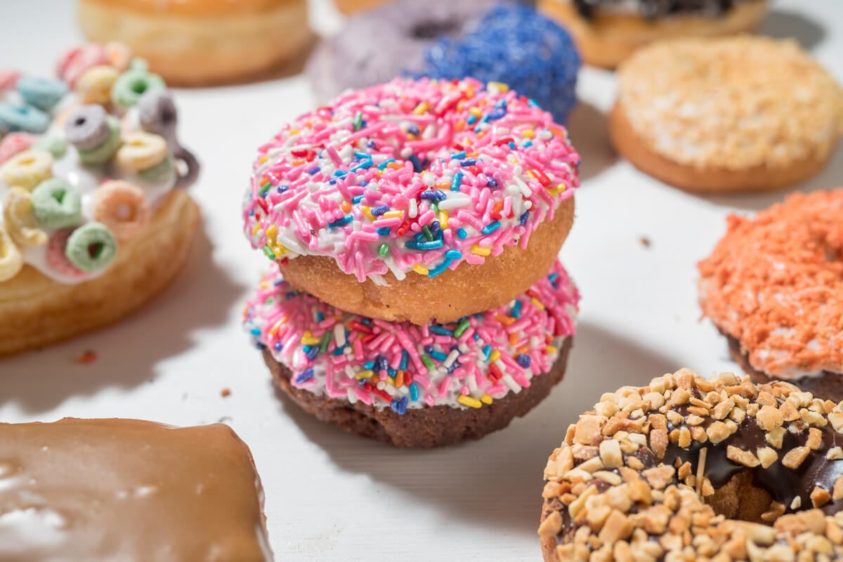 a variety of doughnuts from a shop while dining in portland