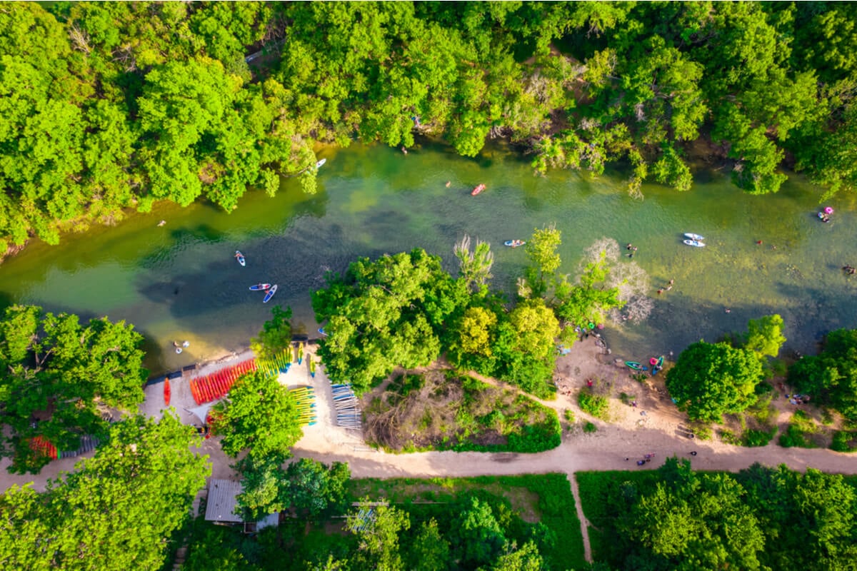 drone shots of kayaks at a river in texas
