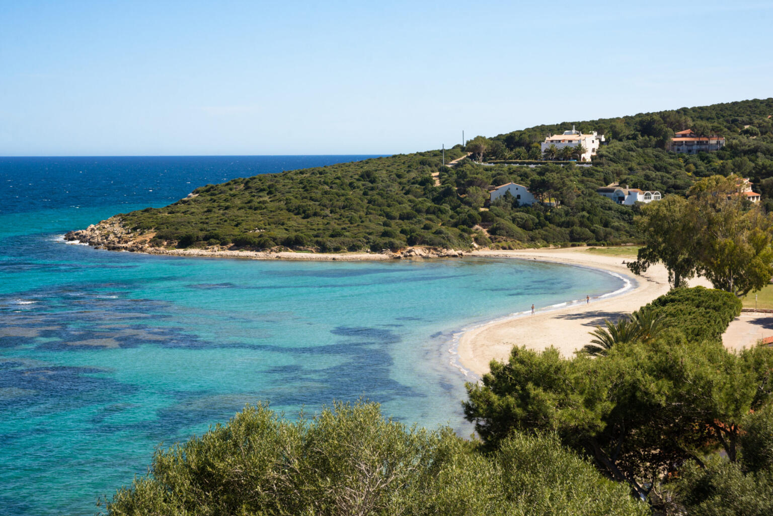 Crystal blue waters at a beach in Sant' Antioco, Sardinia