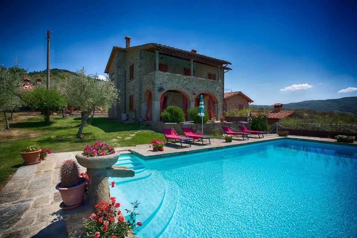 Countryside villa surrounded by olive trees and vineyards