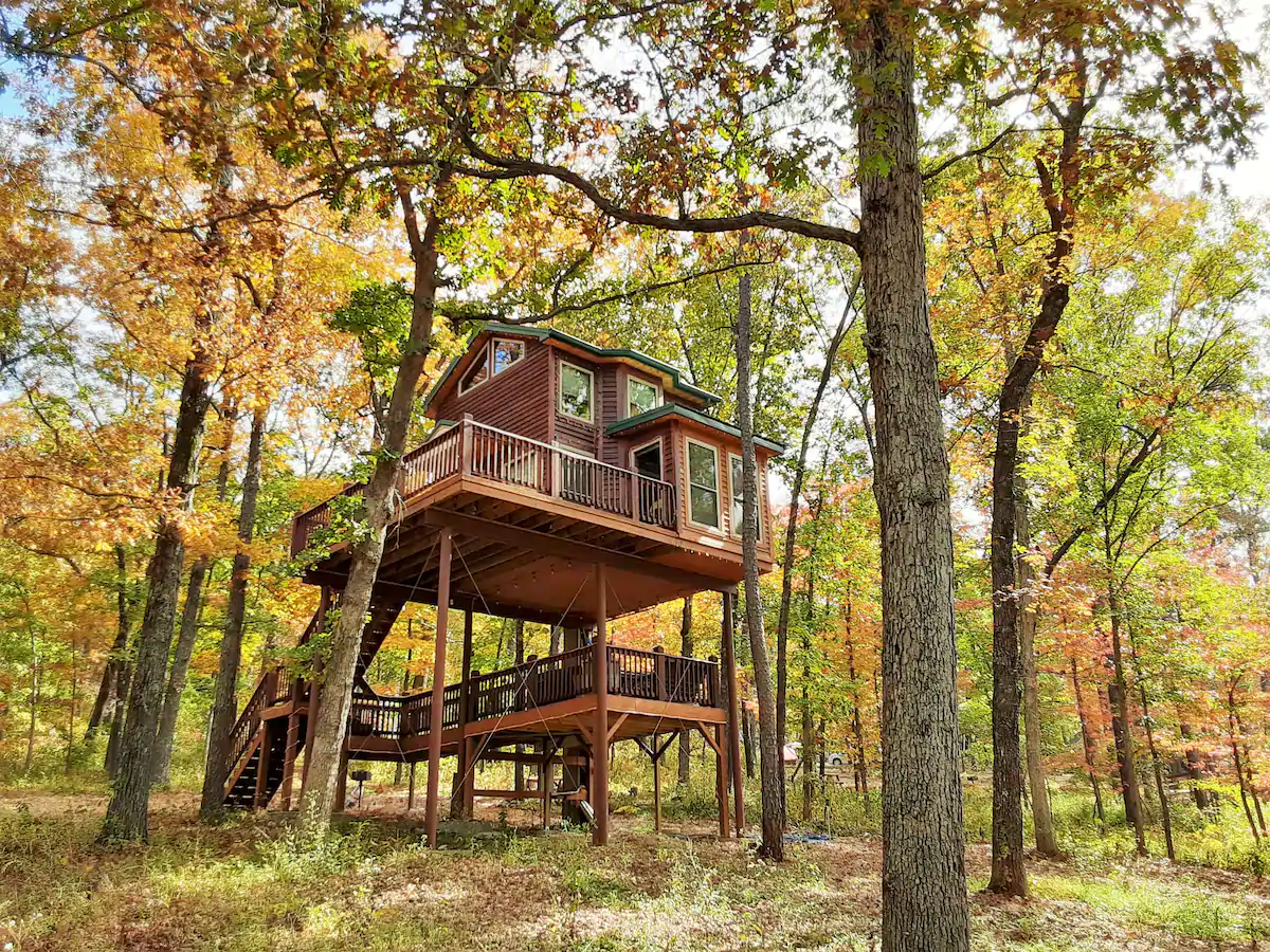 a treehouse in missouri the middle of early fall foliage woods