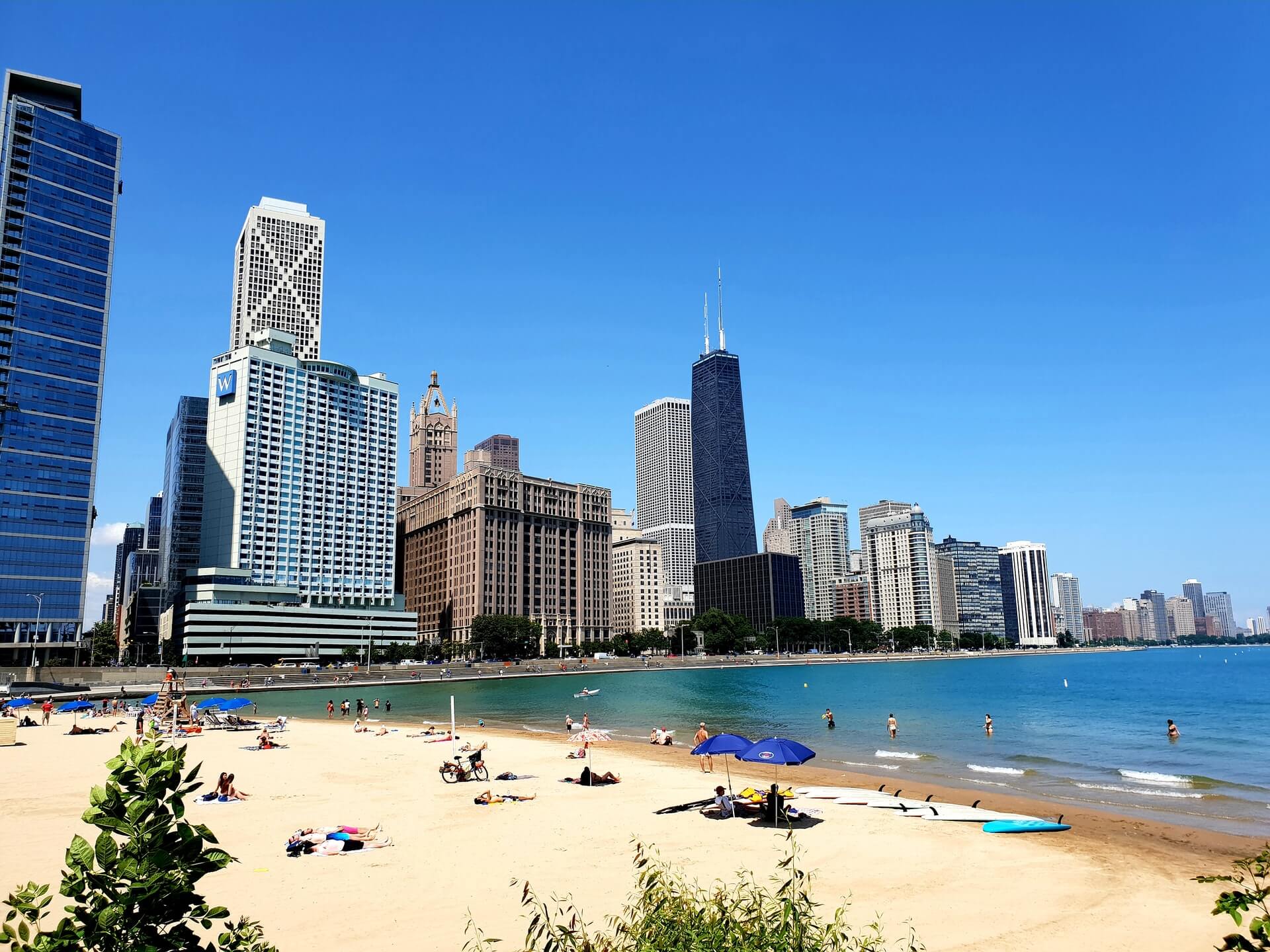 people enjoying a beach while traveling in chicago
