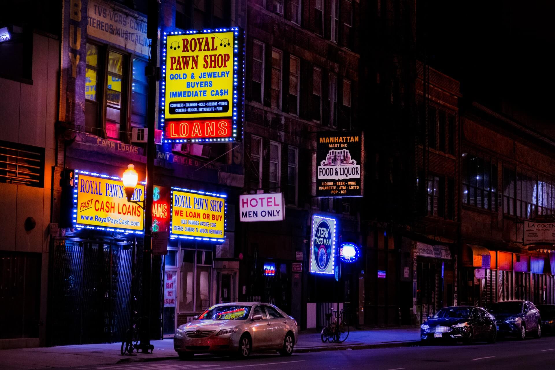 lit up signs on a dark street is chicago safe