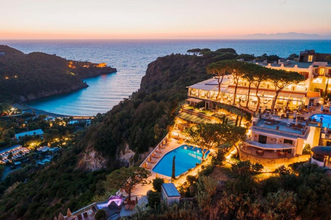 San Montano Resort Spa Ischia lit up a tnight situated on the cliff looking out to sea