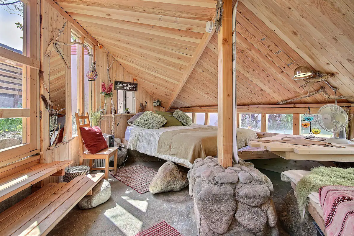 oddly shaped wooden guestroom in hobbit house airbnb in LA