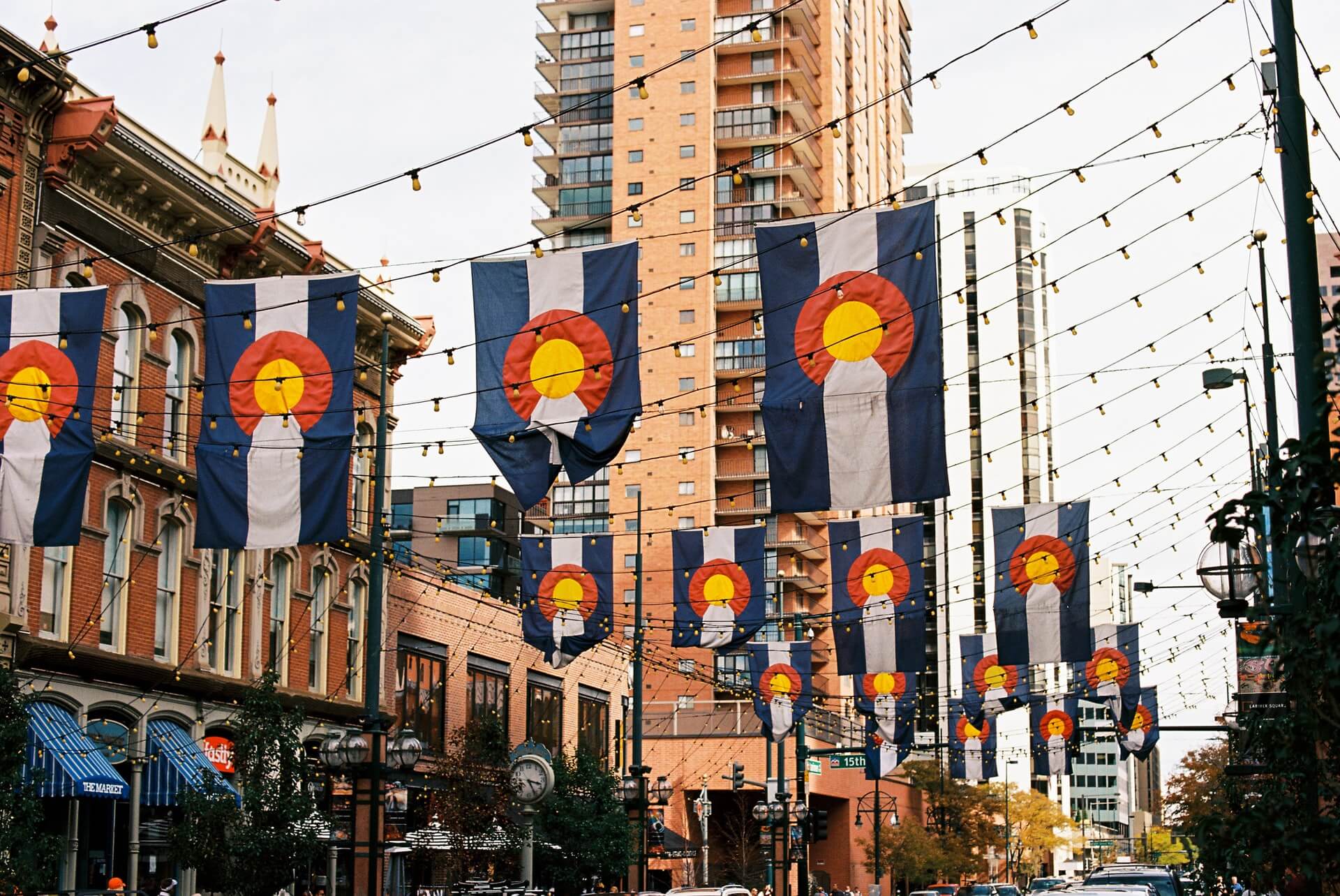 colorado flags hanging in denver street
