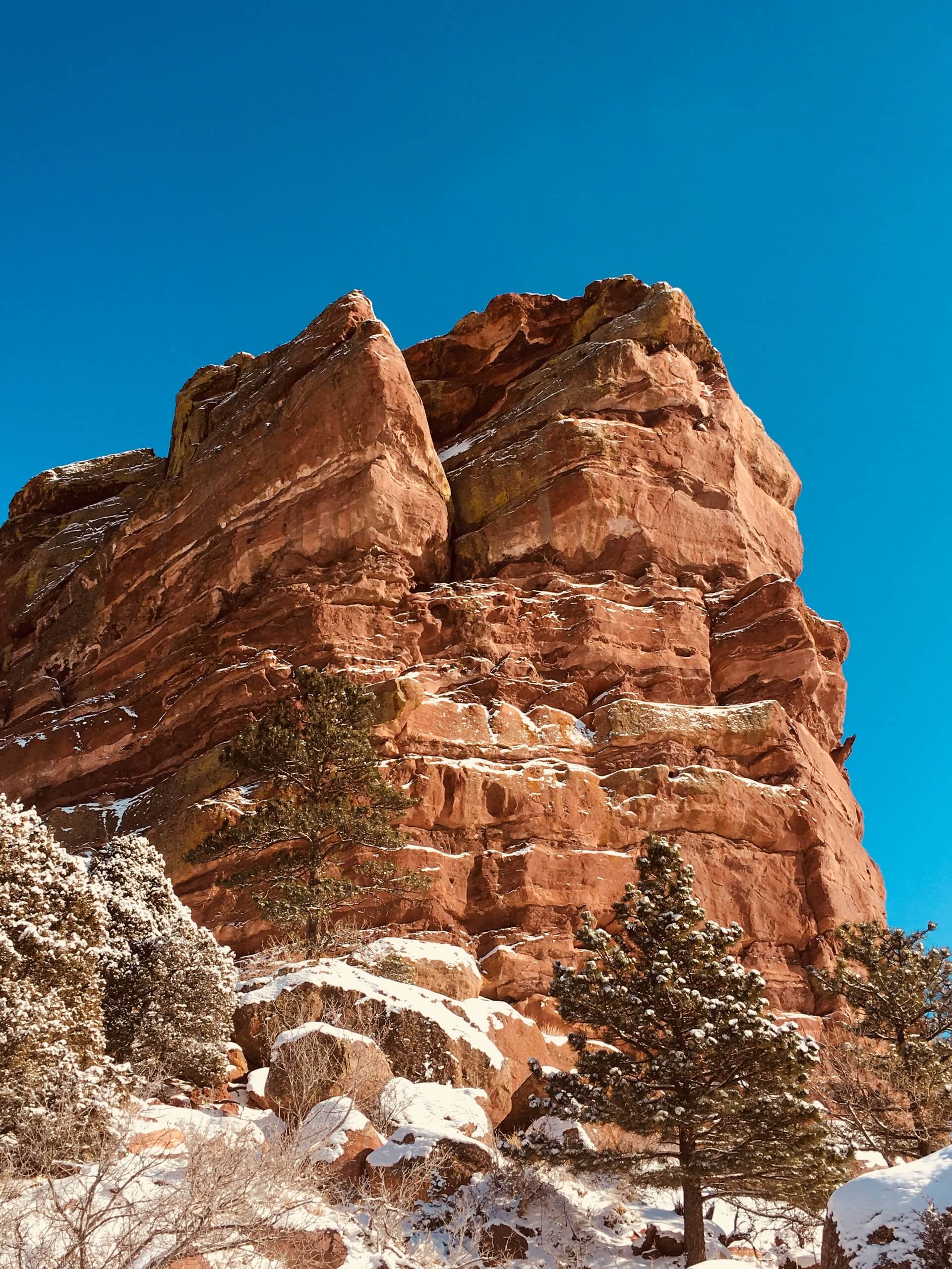 red rocks with snow hiking in denver travel guide