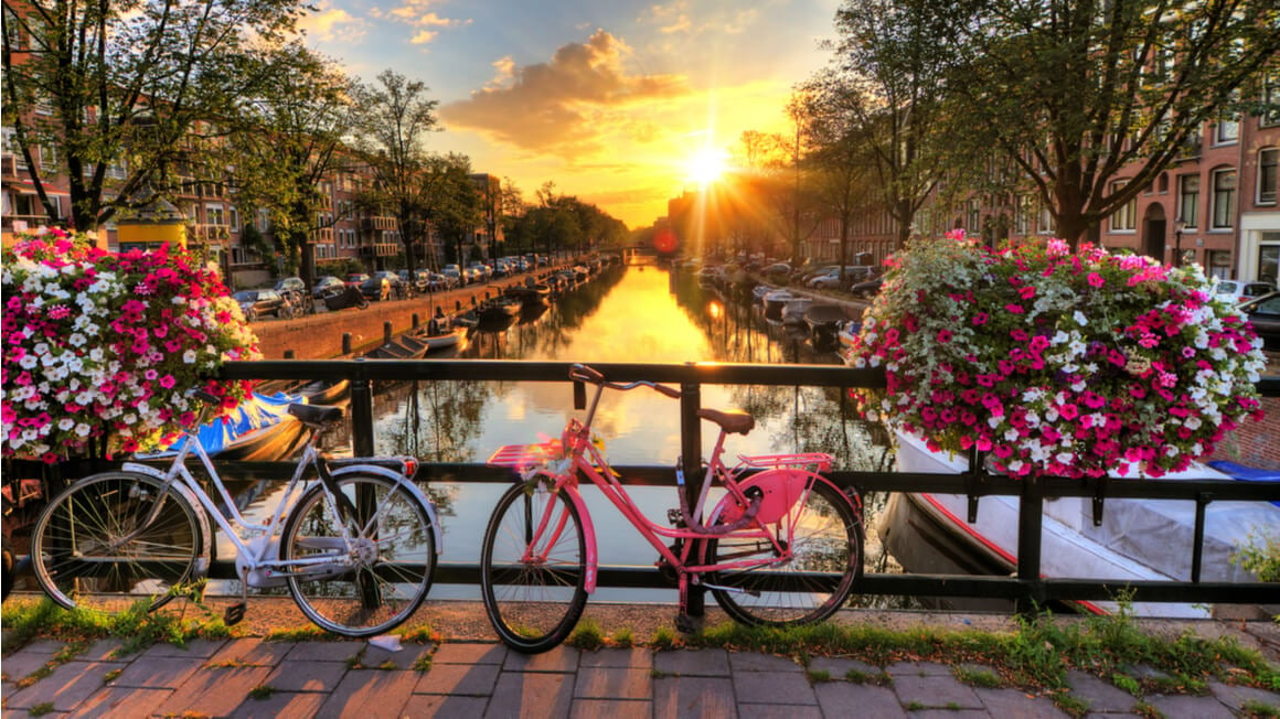 bikes on a bridge in amsterdam