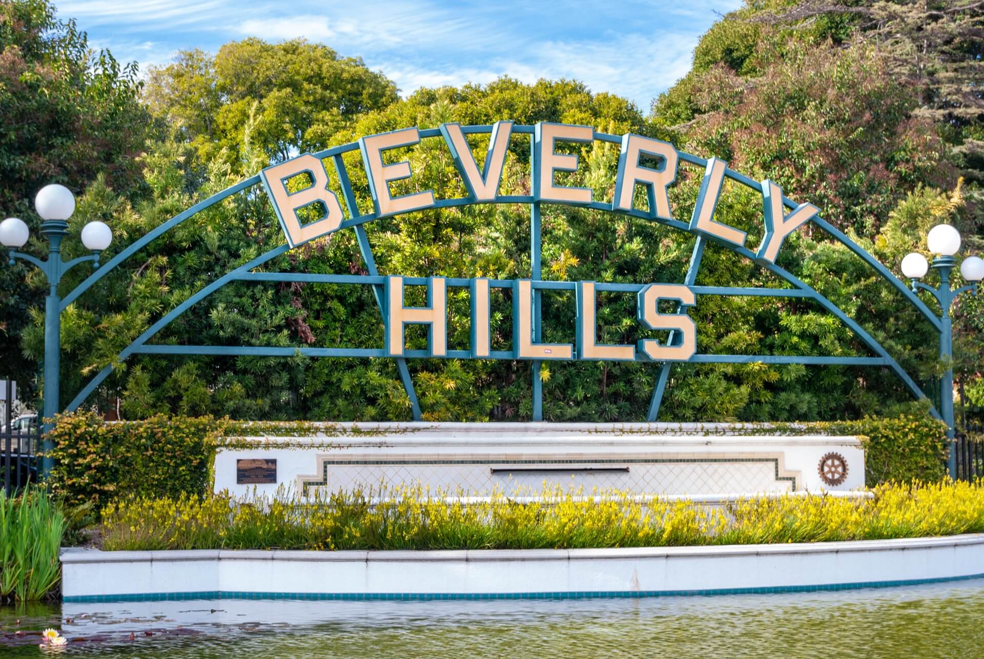 green beverly hills sign seen when traveling in los angeles