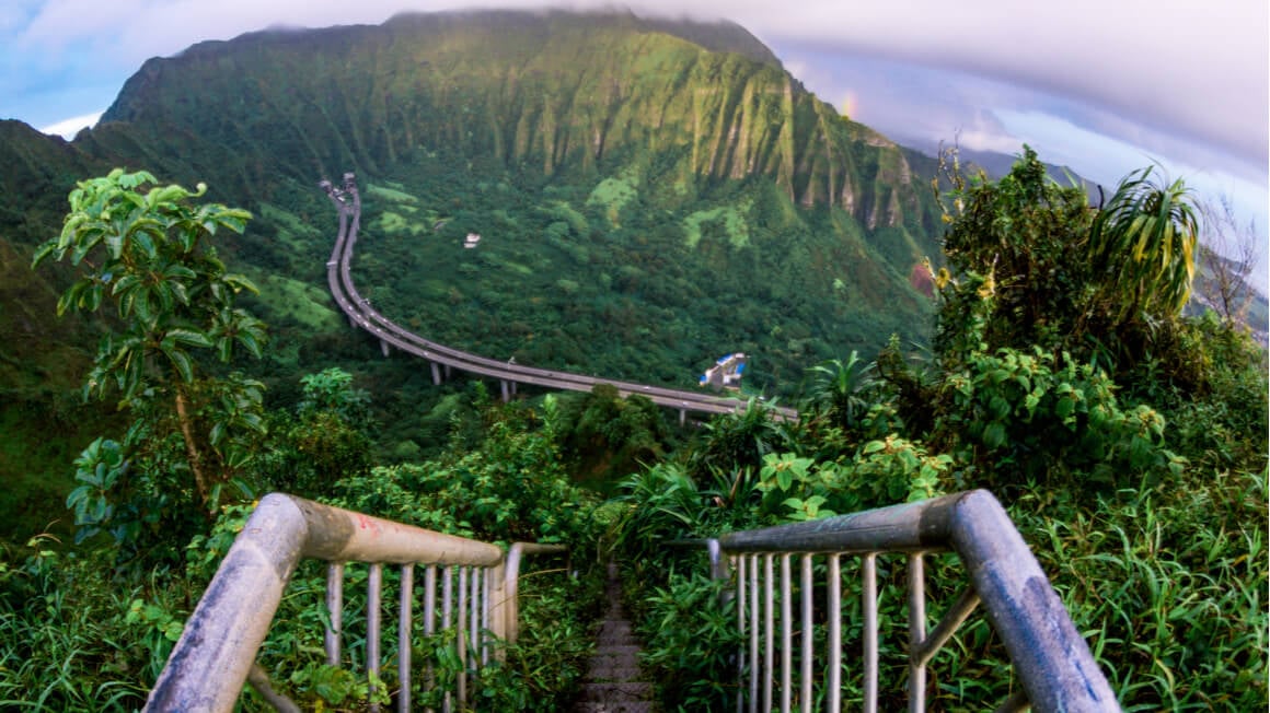 Climbing a stairway in the mountains is part of the magic of staying in Oahu 